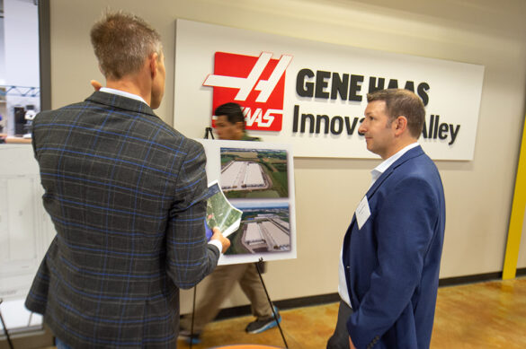 Commercial real estate information displayed at the First Park 94 and CBRE representatives at the 2022 Racine County Commercial Real Estate Showcase event