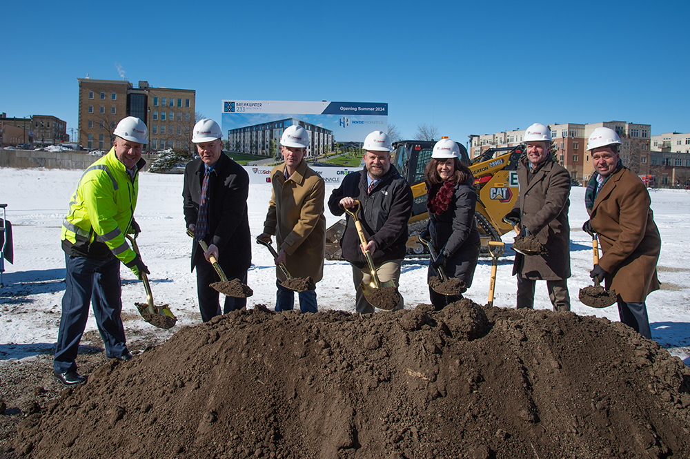 Hovde Properties gathered with partners from the City of Racine, Johnson Financial Group, and CG Schmidt for a groundbreaking ceremony of the Breakwater 233 Apartments..